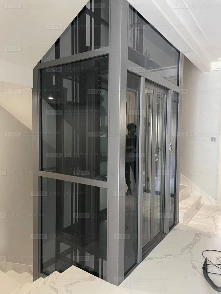 Thang máy gia đình FUJISJ bằng kính titan xám